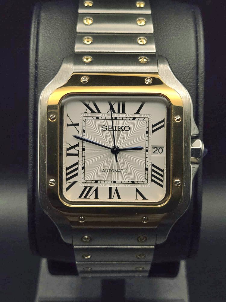 Seiko two-tone automatic with white dial and Roman numerals, front view