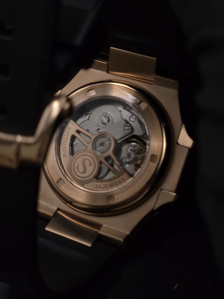 Exhibition caseback of a rose-gold 24-jewel Seiko automatic
