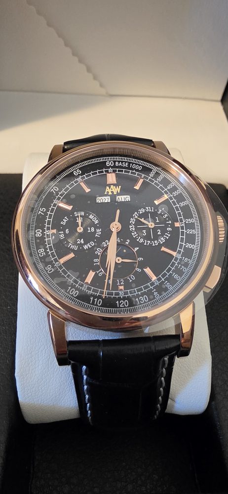 Custom rose-gold moonphase chronograph by All About Watches presented in its box